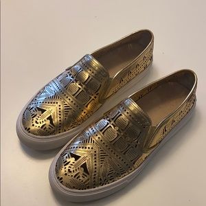 Tory Burch Gold perforated flats - size 7